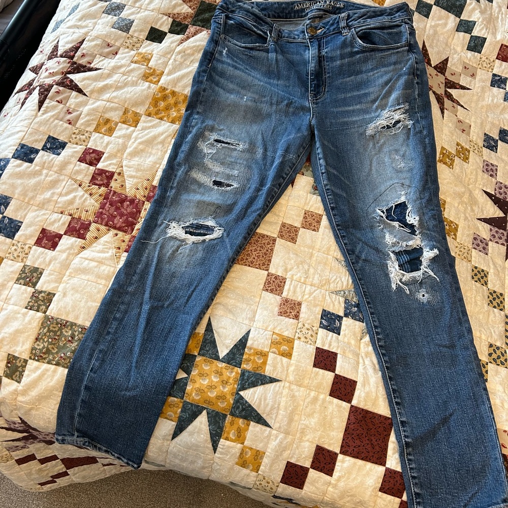 Size 14 American Eagle high rise jegging. Distressed denim.
